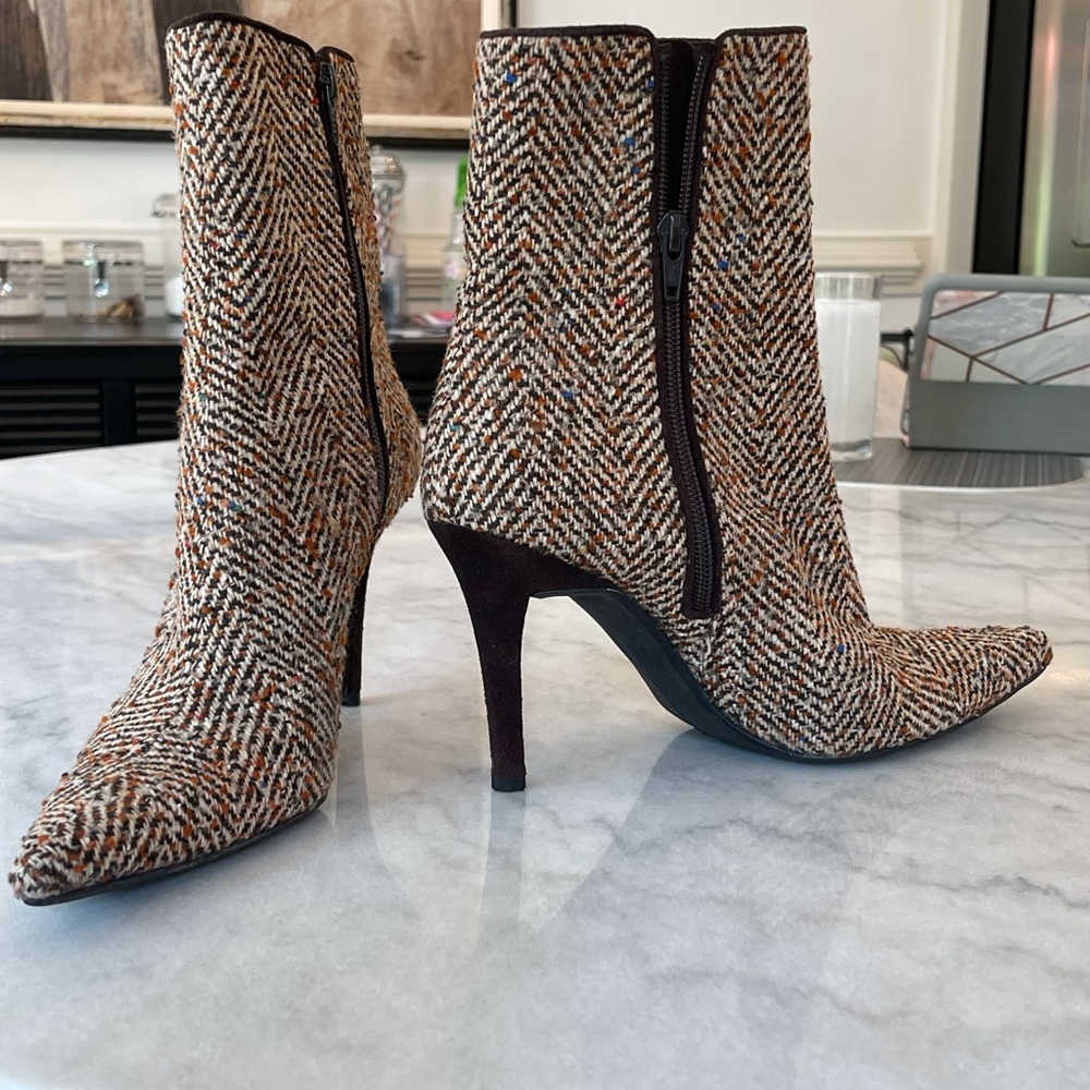 Stuart Weitzman tweed heel boots.